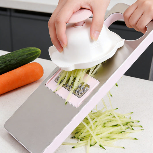 Multi-purpose kitchen grater with protective handle